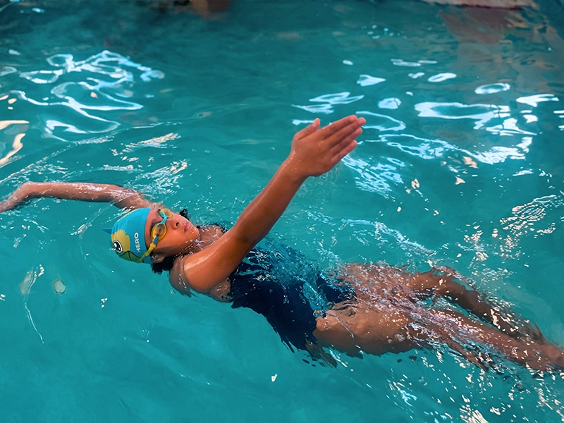 Group Level star 7 Swimmer doing the backstroke at Fintastic